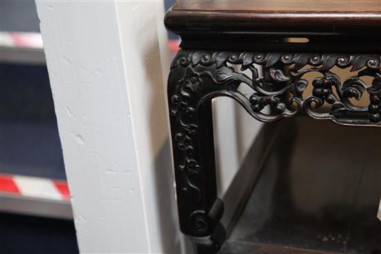 A Chinese hardwood three tier occasional table
